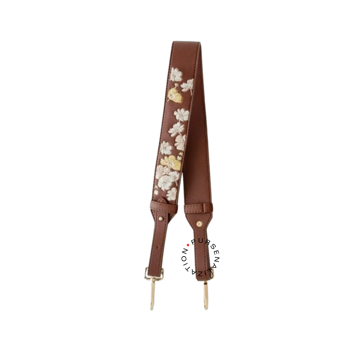 An image of a leather strap adorned with white and yellow buttercup flower embroidery, used for handbags in the variant Allezan, a shade of dark brown.
