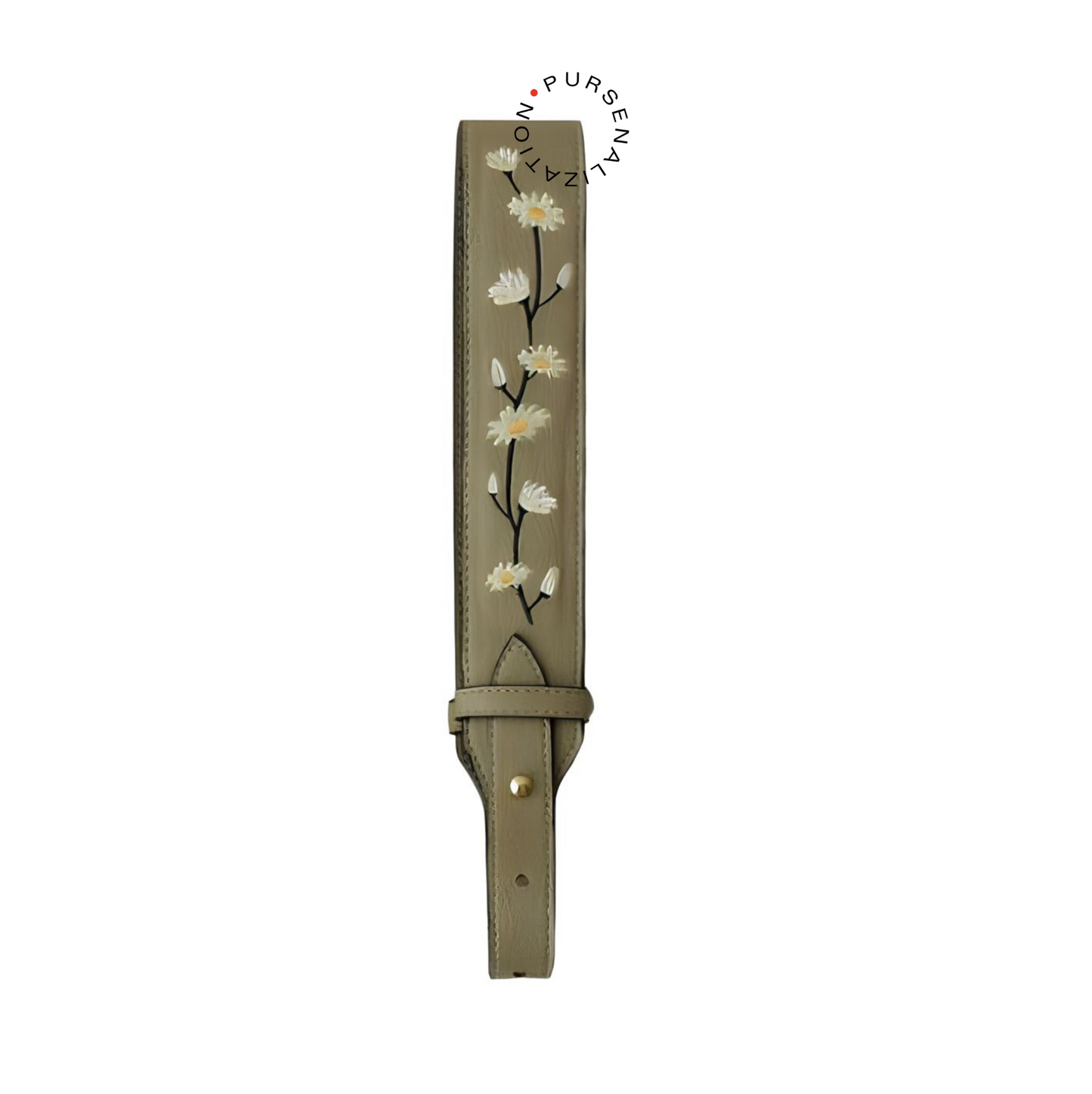 An image of a leather strap adorned with white daisy flower embroidery, used for handbags in the variant Chai, a very dark shade of grayish brown.