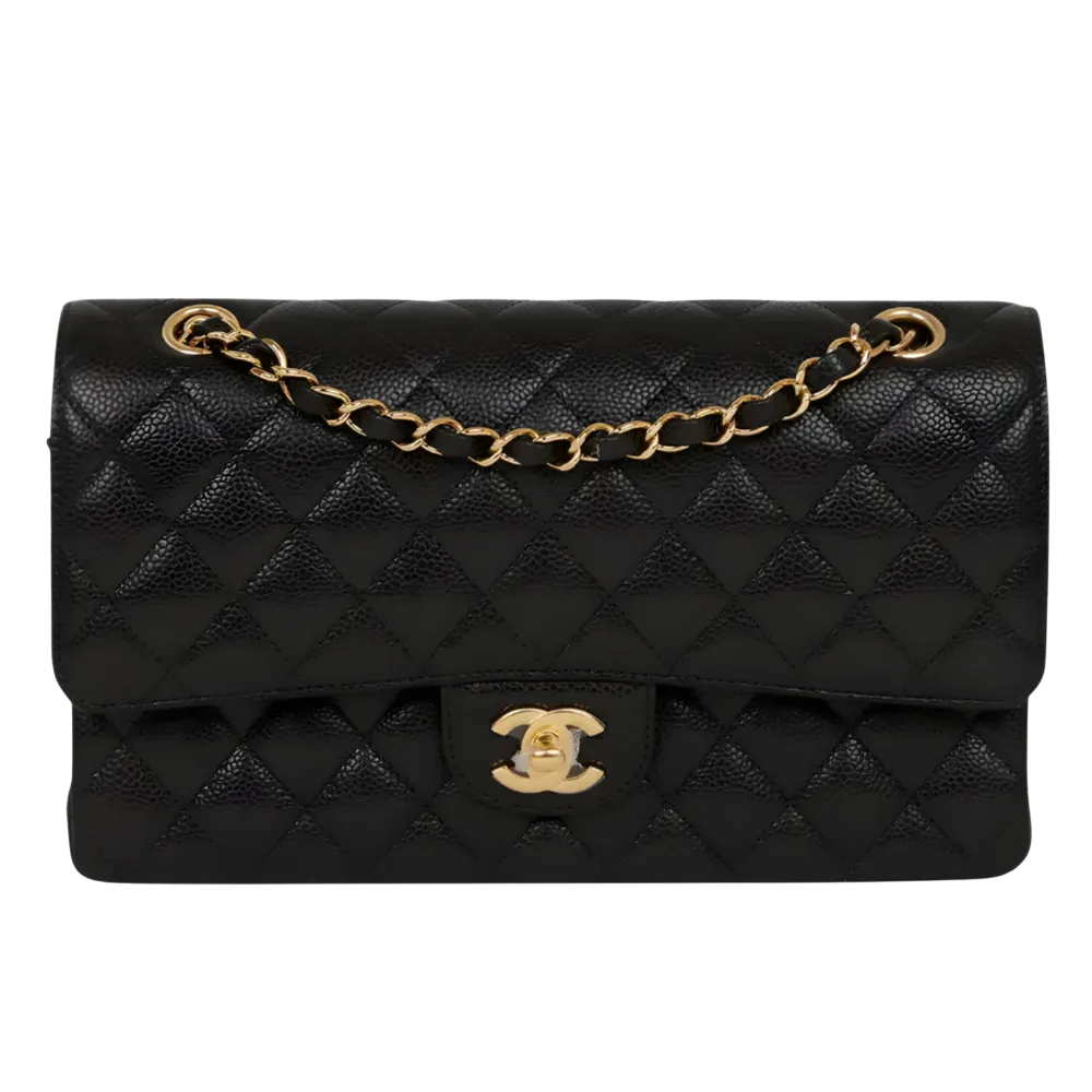 Black Chanel Classic Flap in well-maintained condition with sleek leather and sharp structure.